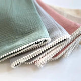 POM-POM Muslin Swaddle Blanket