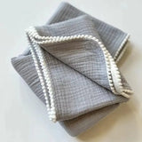 POM-POM Muslin Swaddle Blanket